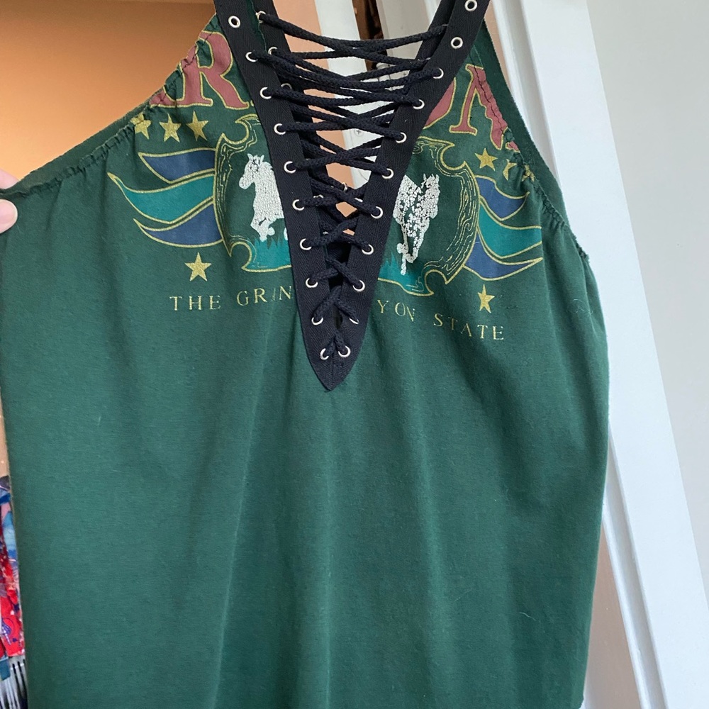 Furst of a kind, original purchase at LF boutique. Hand cut tank top.